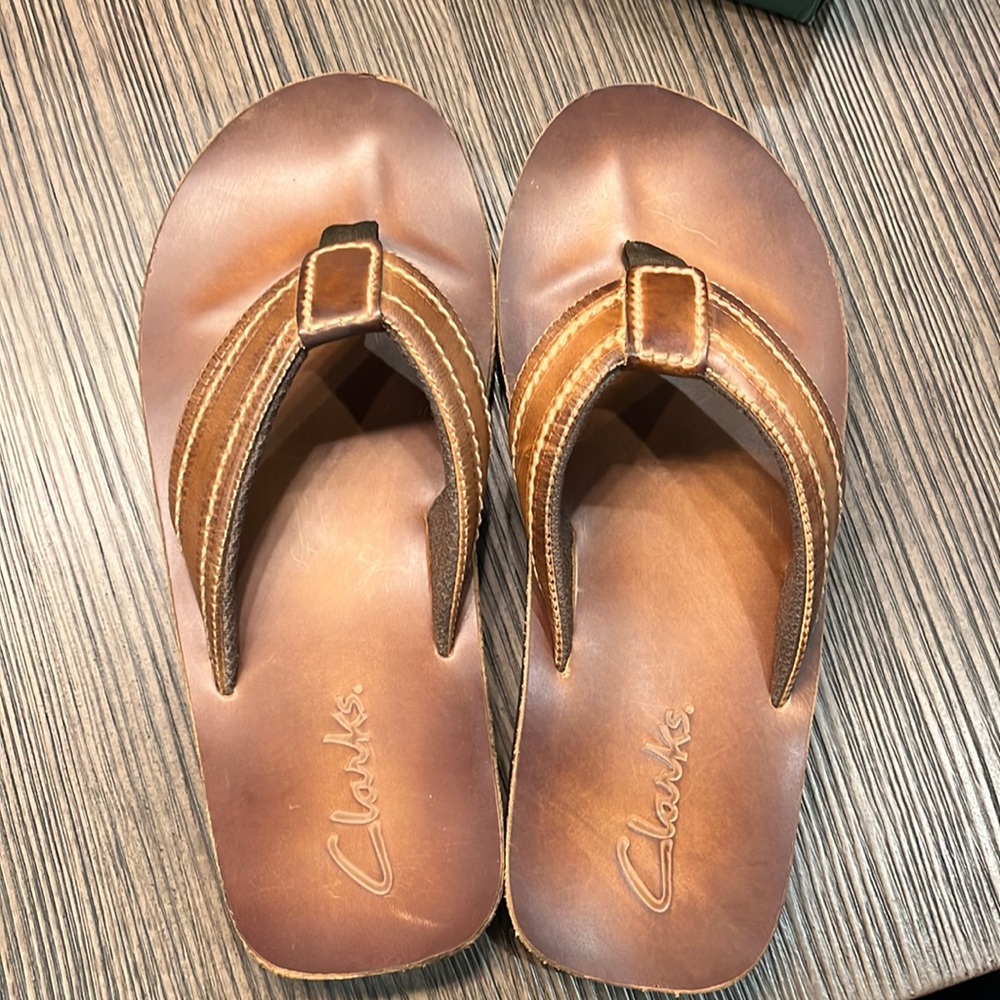 NEVER WORN Clark’s flip flops